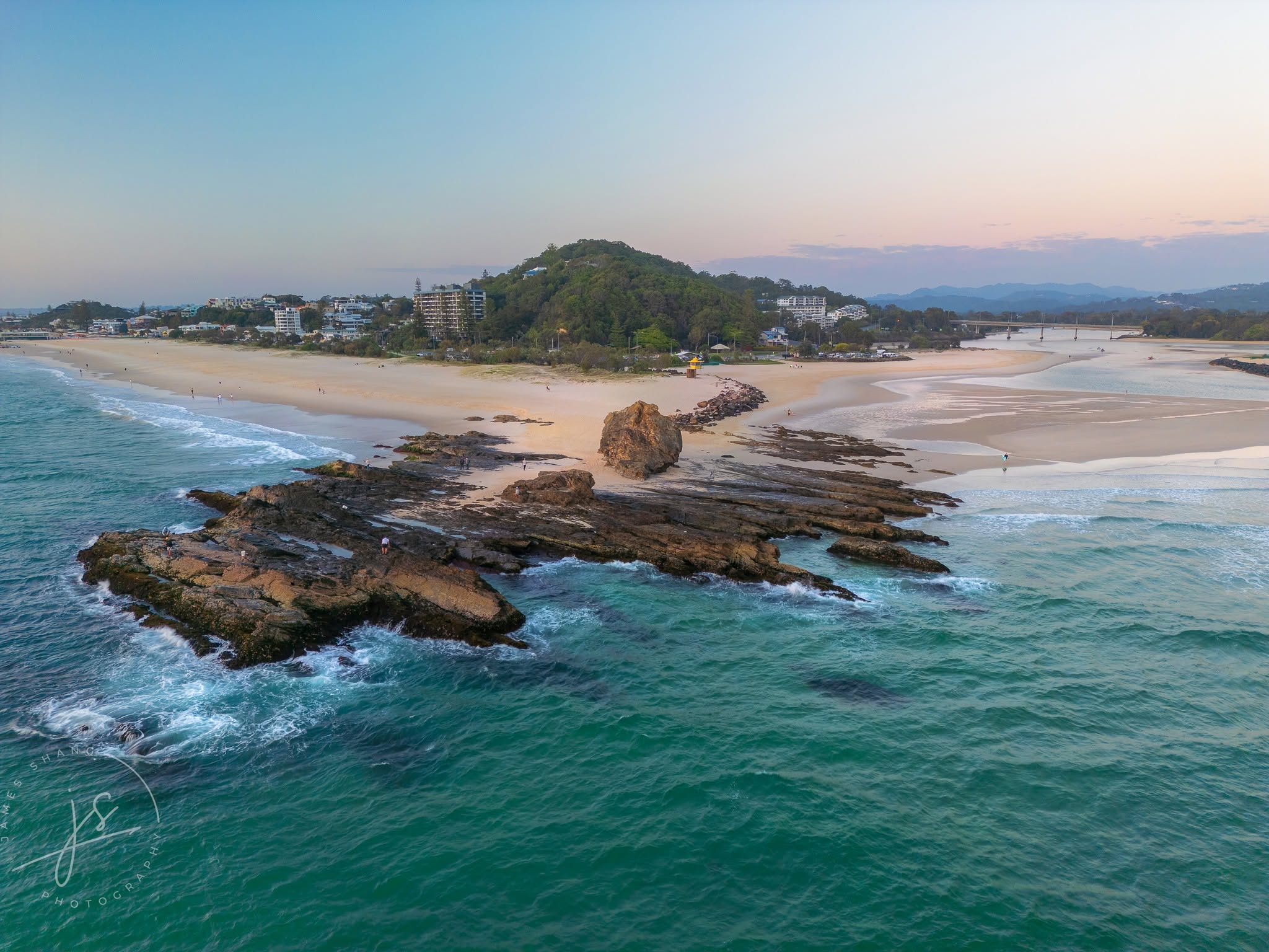 Aerial panorama of Currumbin shoreline and creek at dawn